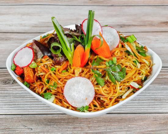 A bowl of food at the table